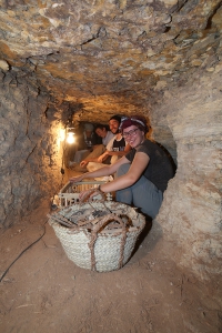 Re-crating the broken crates down in the subterranean complex of Meryneith. Corinna, Christian and Luca helped. Photo: Paolo Del Vesco.